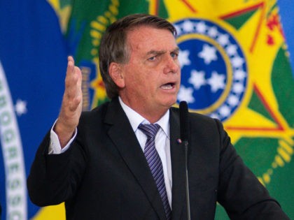President of Brazil Jair Bolsonaro speaks during a farewell ceremony for outgoing minister