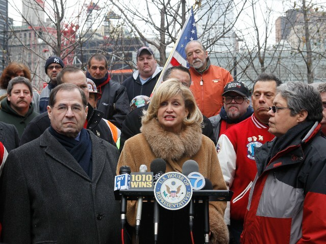 Rep. Carolyn Maloney, center, D-N.Y., is joined by Rep. Jerry Nadler, left, D-N.Y., and by 9/11 responders and survivors and union leaders during a news conference near ground zero, Friday, Dec. 10, 2010 in New York. Maloney and Nadler, the authors of H.R. 847, the James Zadroga 9/11 Health and …