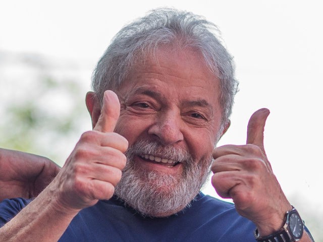SAO BERNARDO DO CAMPO, BRAZIL - APRIL 07: Former President Luiz Inacio Lula da Silva gestures to supporters at the headquarters of the Metalworkers' Union where a Catholic mass was held in memory of his late wife Marisa Leticia on April 7, 2018 in the Sao Bernardo do Campo section …