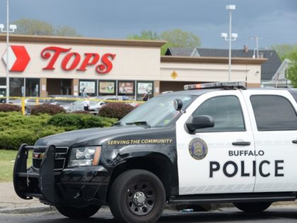 BUFFALO, NY - MAY 14: Buffalo Police on scene at a Tops Friendly Market on May 14, 2022 in Buffalo, New York. According to reports, at least 10 people were killed after a mass shooting at the store with the shooter in police custody.