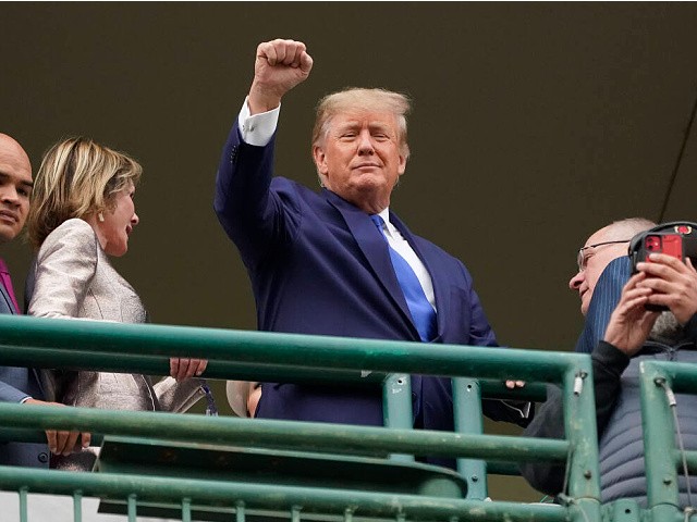 Former President Donald Trump waves to the crowd before the 148th running of the Kentucky Derby horse race at Churchill Downs Saturday, May 7, 2022, in Louisville, Ky. (AP Photo/Mark Humphrey)