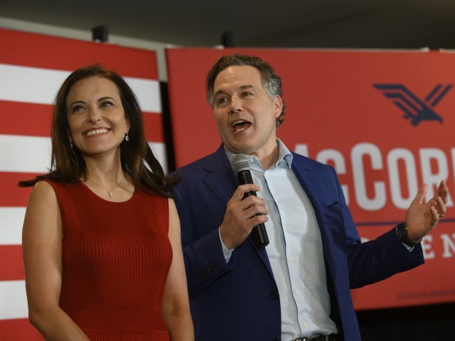 PITTSBURGH, PA - MAY 17: Pennsylvania Republican Senate candidate Dave McCormick and his wife, Dina Powell McCormick, speak to supporters at the Indigo Hotel during a primary election night event on May 17, 2022, in Pittsburgh, Pennsylvania. Polls reveal McCormick holds a close lead over Dr. Mehmet Oz as the Republican primary race is still too close to call. (Jeff Swensen/Getty Images)