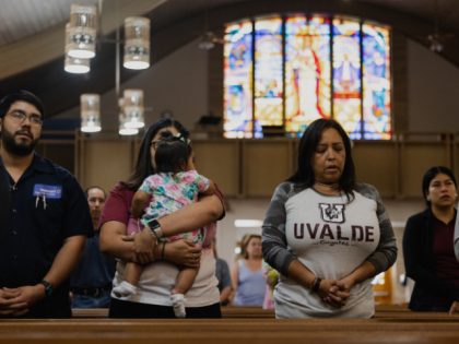 UVALDE, TX - MAY 25: Parishioners mourn at Sacred Heart Catholic Church on May 25, 2022 in Uvalde, Texas. On May 24, 21 people were killed, including 19 children, during a mass shooting at Robb Elementary School. The shooter, identified as 18-year-old Salvador Ramos, was reportedly killed by law enforcement. …