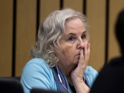 FILE - Romance writer Nancy Crampton Brophy, accused of killing her husband, Dan Brophy, in June 2018, watches proceedings in court in Portland, Ore., Monday, April 4, 2022. A jury in Portland, Oregon, has convicted the self-published romance novelist — who once wrote an essay titled "How to Kill Your …