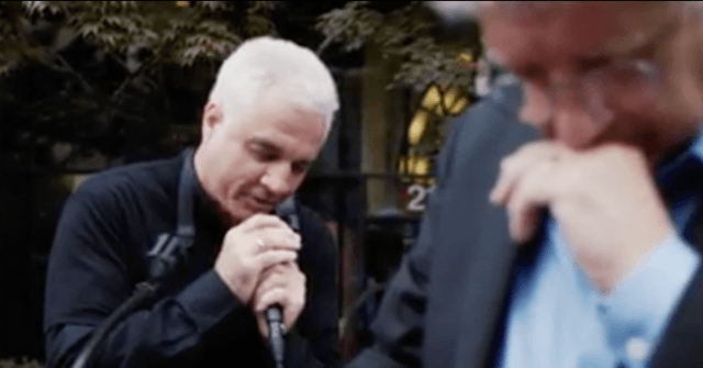 Watch: Abortion protesters shout as Catholic priest prays for them