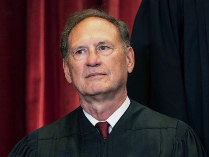 Associate Justice Samuel Alito sits during a group photo at the Supreme Court in Washington, Friday, April 23, 2021. (Erin Schaff/The New York Times via AP, Pool)