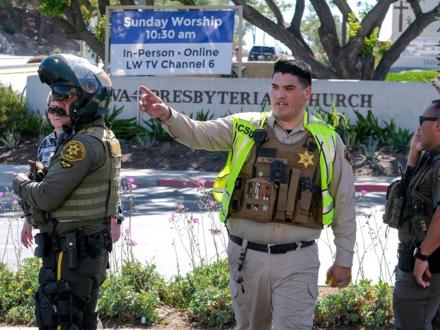 Police investigate after a shooting inside Geneva Presbyterian Church in Laguna Woods, California, on May 15, 2022. - One person was dead and four people were "critically" injured in a shooting at a church near Los Angeles, law enforcement said Sunday, just one day after a gunman killed 10 people at a grocery store in New York state.