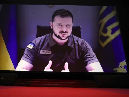 President of Ukraine Volodymyr Zelenskyy appears via remote during the opening ceremony of