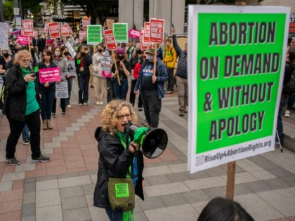 SEATTLE, WA - MAY 03: Demonstrators gather during a rally in support of abortion rights at Westlake Park on May 3, 2022 in Seattle, Washington. A leaked draft opinion by Justice Samuel Alito has suggested that the U.S. Supreme Court is poised to overturn Roe v. Wade, a historic ruling …