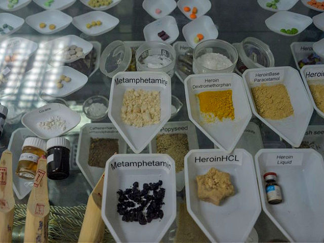 In this photograph taken on November 12, 2019, samples of drugs including methamphetamine