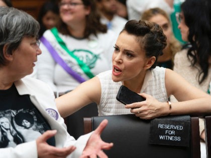 Actress and activist Alyssa Milano joins supporters of the Equal Rights Amendment at a House Judiciary Committee hearing on Capitol Hill in Washington, Tuesday, April 30, 2019. (AP Photo/J. Scott Applewhite)