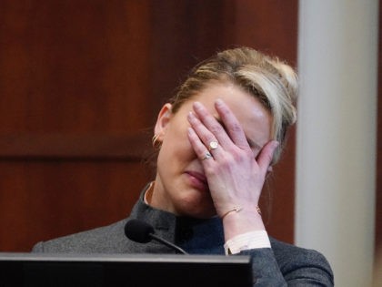 Actor Amber Heard testifies in the courtroom at the Fairfax County Circuit Courthouse in Fairfax, Va., Monday, May 16, 2022. Actor Johnny Depp sued his ex-wife Amber Heard for libel in Fairfax County Circuit Court after she wrote an op-ed piece in The Washington Post in 2018 referring to herself …