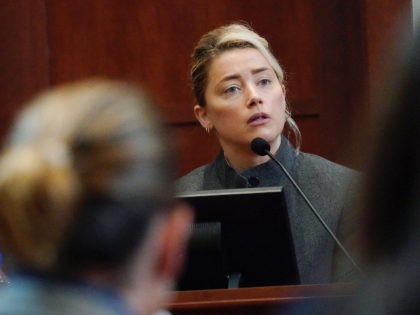 Actor Amber Heard testifies in the courtroom at the Fairfax County Circuit Courthouse in F