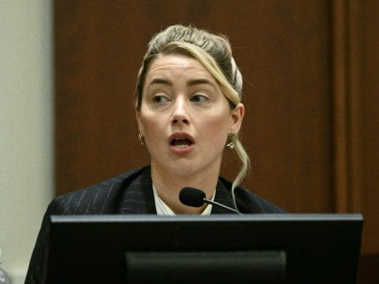 US actress Amber Heard testifies in the courtroom at the Fairfax County Circuit Courthouse