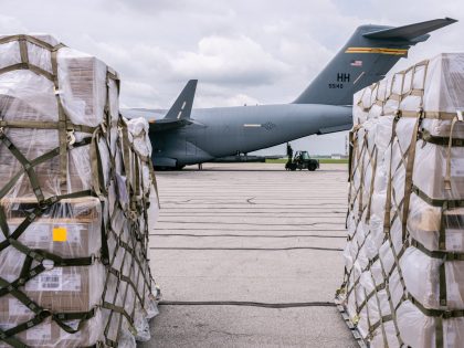 INDIANAPOLIS, IN - MAY 22: Pallets of formula is seen near a U.S. Air Force C-17 carrying 78,000 lbs of Nestlé Health Science Alfamino Infant and Alfamino Junior formula from Europe at Indianapolis Airport on May 22, 2022 in Indianapolis, Indiana. The mission, known as Operation Fly Formula, is being …