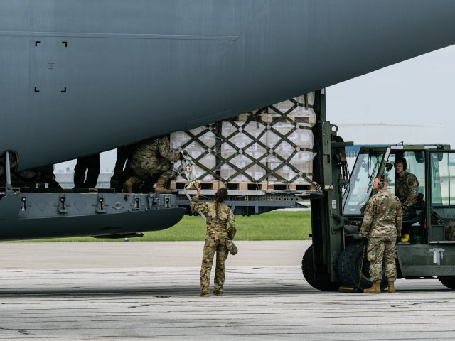 INDIANAPOLIS, IN - MAY 22: Airmen unload pallets from the cargo bay of a U.S. Air Force C-17 carrying 78,000 lbs of Nestlé Health Science Alfamino Infant and Alfamino Junior formula from Europe at Indianapolis Airport on May 22, 2022 in Indianapolis, Indiana. The mission, known as Operation Fly Formula, …