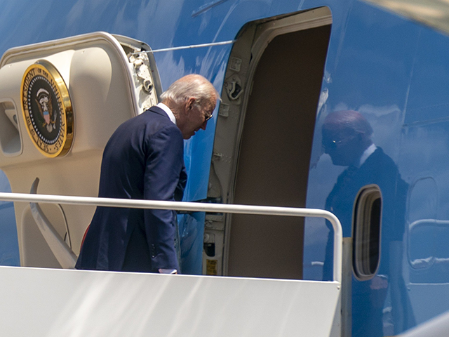 President Joe Biden boards Air Force One at Andrews Air Force Base, Md., Thursday, May 19, 2022, to travel to Seoul, Korea to begin his first trip to Asia as President. (AP Photo/Andrew Harnik)