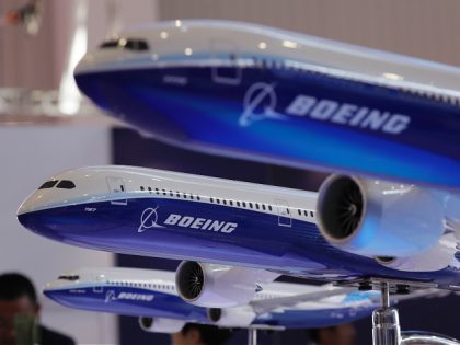 FILE- In this Nov. 6, 2018, file photo, models of Boeing passenger airliners are displayed