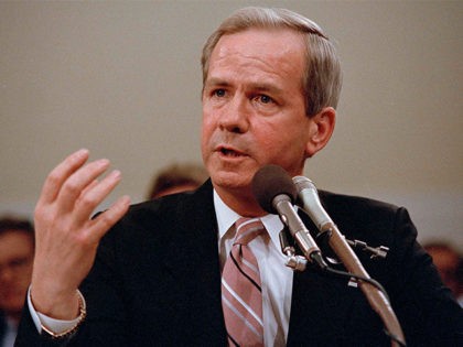 Former national security adviser Robert C. McFarlane gestures while testifying before the House-Senate panel investigating the Iran-Contra affair on Capitol Hill in Washington, May 13, 1987. (AP Photo/Lana Harris)