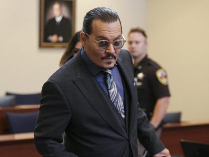 Actor Johnny Depp arrives at the Fairfax County Circuit Courthouse in Fairfax, Va., Wednes