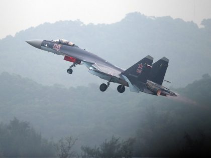A Sukhoi SU-35 fighter jet takes off during a test flight ahead of the Airshow China 2014 in Zhuhai, South China's Guangdong province on November 10, 2014. The 10th Airshow China 2014 takes place from November 11 to 16. AFP PHOTO / JOHANNES EISELE (Photo credit should read JOHANNES EISELE/AFP …