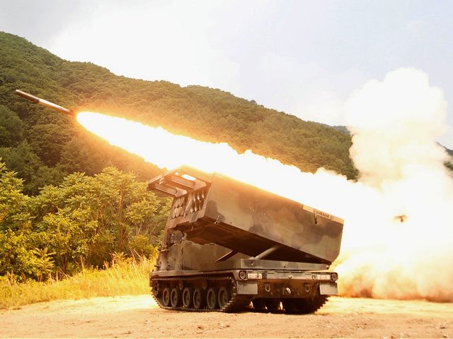 A rocket is fired into the air from a U.S. Multiple Launch Rocket System vehicle in a live fire drill during joint military exercises by the U.S. and South Korea in Cheorwon, South Korea, Tuesday, June 12, 2012. (AP Photo/Ahn Young-joon)