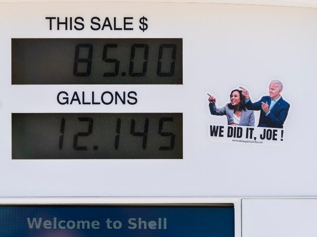 A political sticker mocking President Joe Biden and Vice President Kamala Harris is seen next to a gas pump display showing a transaction in Los Angeles, Monday, March 7, 2022. The price of regular gasoline broke $4 per gallon on average across the U.S. on Sunday for the first time …