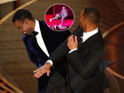 TOPSHOT - US actor Will Smith (R) slaps US actor Chris Rock onstage during the 94th Oscars at the Dolby Theatre in Hollywood, California on March 27, 2022. (Photo by Robyn Beck / AFP) (Photo by ROBYN BECK/AFP via Getty Images)