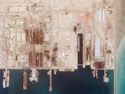 This satellite photo from Planet Labs PBC shows the Iranian Revolutionary Guard's newest ship, the Shahid Mahdavi, center right, under construction in a shipyard west of Bandar Abbas, Iran, Saturday, May 21, 2022. Iran's paramilitary Revolutionary Guard is building the massive new support ship near the strategic Strait of Hormuz …