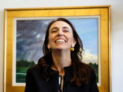 WASHINGTON, DC - MAY 25: New Zealand Prime Minister Jacinda Ardern and Sen. Angus King (I-ME) share a laugh before a meeting with Sen. Jon Ossoff (D-GA) in the Dirksen Senate Office Building on Capitol Hill on May 25, 2022 in Washington, DC. After closing the borders for over two …