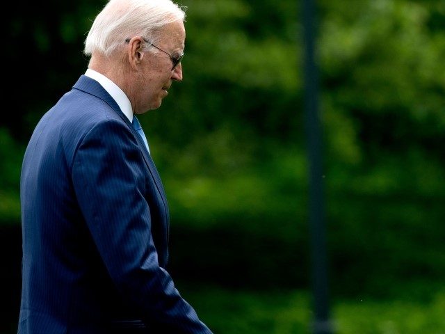 US President Joe Biden walks to the Oval Office after disembarking Marine One on the South Lawn of the White House in Washington, DC, on May 18, 2022. - Biden travelled to Joint Base Andrews to receive a briefing on interagency efforts to prepare for and respond to hurricanes this …