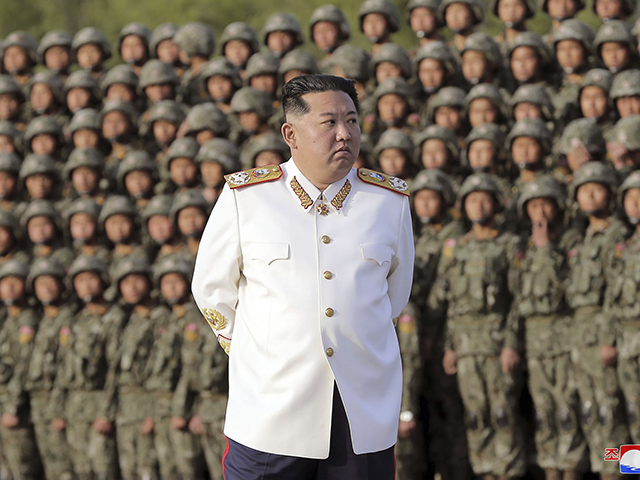 In this photo provided by the North Korean government, North Korean leader Kim Jong Un attends a photo session with the officers and soldiers who took part in a celebration the 90th founding anniversary of the Korean People's Revolutionary Army, in North Korea Wednesday, April 27, 2022. North Korea launched …
