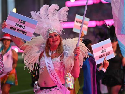 People participate in the 44th Sydney Gay and Lesbian Mardi Gras Parade at the Sydney Cricket Ground (SCG) in Sydney on March 5, 2022. (Photo by Steven SAPHORE / AFP) (Photo by STEVEN SAPHORE/AFP via Getty Images)