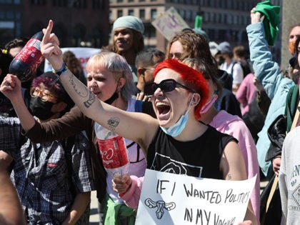 Pro-abortion activists scream and yell obscenities at a group of pro-life activists during a demonstration on May 7, 2022, in Chicago, Illinois. (Scott Olson/Getty Images)