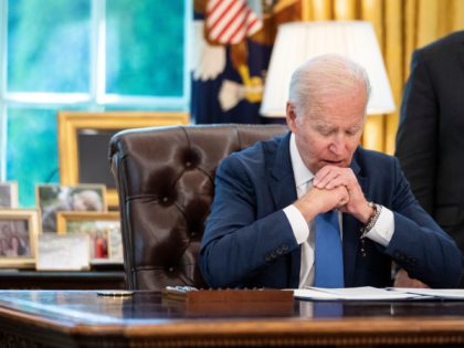 WASHINGTON, DC - MAY 9: U.S. President Joe Biden speaks to reporters before signing the Ukraine Democracy Defense Lend-Lease Act of 2022 in the Oval Office of the White House May 9, 2022 in Washington, DC. The Ukraine Democracy Defense Lend-Lease Act of 2022 was unanimously passed by the U.S. …