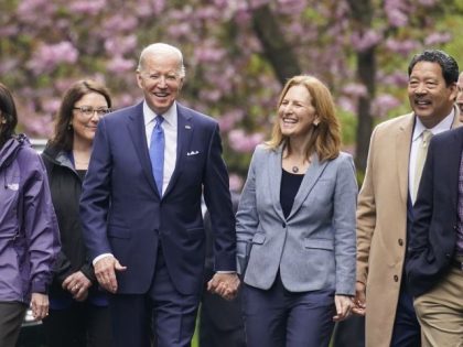 President Joe Biden arrives to speak at Seward Park on Earth Day, Friday, April 22, 2022, in Seattle. From left, Sen. Patty Murray, D-Wash., Rep. Rick Larsen, D-Wash., Sen. Maria Cantwell, D-Wash., Rep. Suzan DelBene, D-Wash., Biden, Rep. Kim Schrier, D-Wash., Seattle Mayor Bruce Harrell, Rep. Adam Smith, D-Wash., and …