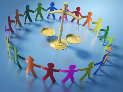Circle of People with Scales of Justice - stock photo