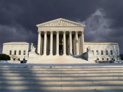 Dark forbidding troubled storm sky over the United States Supreme Court building in Washin