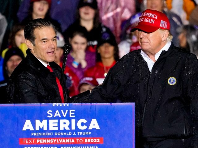 Pennsylvania Senate candidate Mehmet Oz, left, accompanied by former President Donald Trump, speaks at a campaign rally in Greensburg, Pa., Friday, May 6, 2022. (AP Photo/Gene J. Puskar)