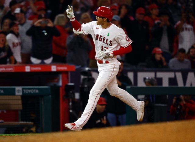 Los Angeles Angels star Shohei Ohtani celebrates after hitting the first grand slam of his