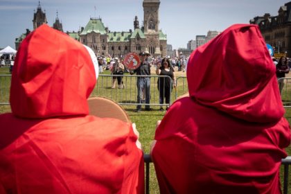 Opponents and proponents of abortion rights face off in front of Canada's parliament