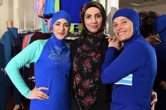 The burkini, seen here modelled at a shop in Australia, is a controversial bathing suit in