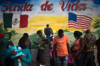 Haitian migrants are seen outside the Senda de Vida (Path of Life) shelter in the Mexican border city of Reynosa