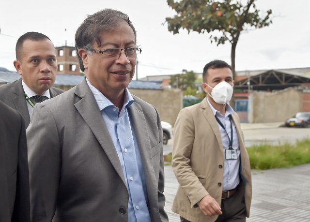 Colombian presidential candidate Gustavo Petro arrives for a debate at a radio station in