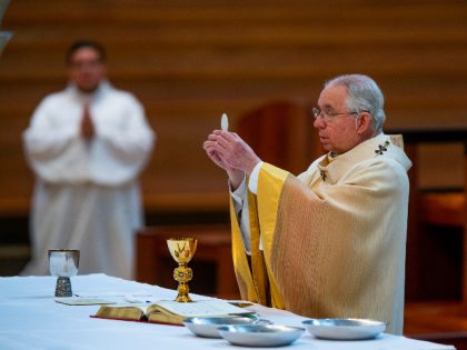 Archbishop Jose H. Gomez celebrates the the Solemnity of the Most Holy Trinity, a Mass with churchgoers present at the Cathedral of Our Lady of the Angels in downtown Los Angeles on Sunday, June 7, 2020. It was his first Mass since public Masses throughout the Archdiocese of Los Angeles …