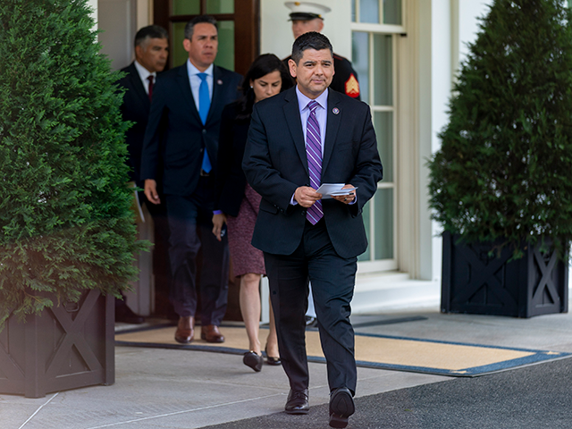 Congressional Hispanic Caucus Chairman Rep. Raul Ruiz, D-Calif., center, and other members walk out of the West Wing to speak to members of the media following a meeting with President Joe Biden at the White House in Washington, Monday, April 25, 2022. (AP Photo/Andrew Harnik)