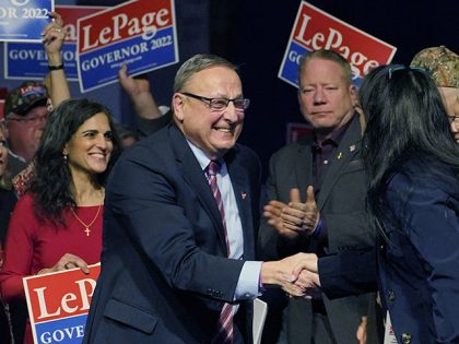 Republican candidate for governor Paul LePage greets supporters at the Republican state convention, Saturday, April 30, 2022, in Augusta, Maine. (AP Photo/Robert F. Bukaty)