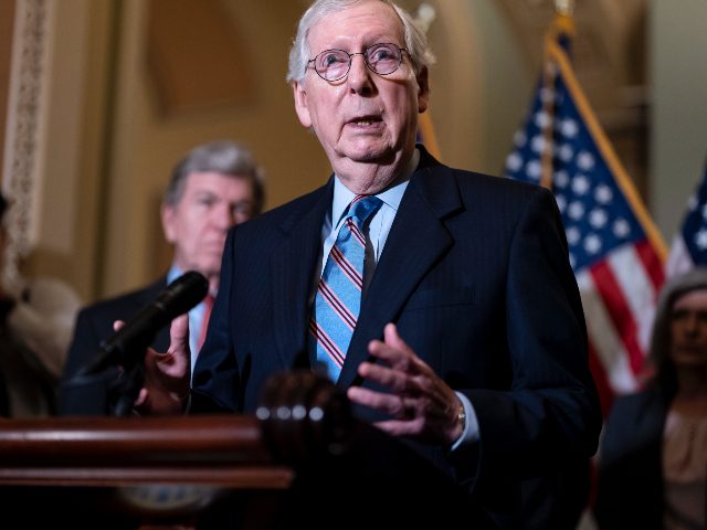 Senate Minority Leader Mitch McConnell, R-Ky., speaks with reporters following a closed-do