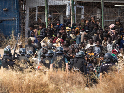 Pictures: 18 Dead as 2,000 African Migrants Storm Spanish Enclave