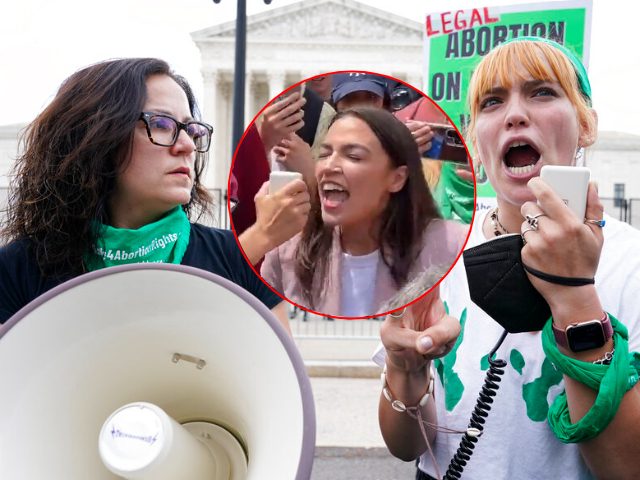 Abortion-rights activists react outside the Supreme Court in Washington, Friday, June 24,